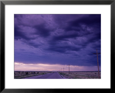 Car Traveling Down The Highway, New Mexico by Kenneth Garrett Pricing Limited Edition Print image