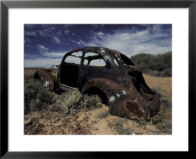 Burnt Out Antique Car Wreck Discarded To Rust Away In The Desert, Australia by Jason Edwards Pricing Limited Edition Print image