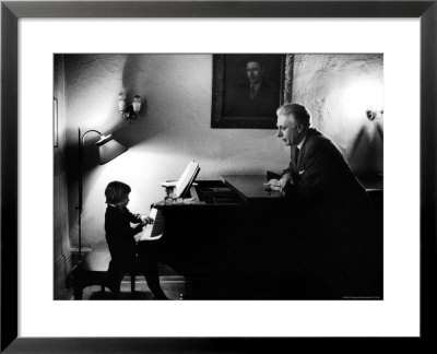 Piano Teacher Giving Lesson To Young Student In A Carnegie Hall Studio by Alfred Eisenstaedt Pricing Limited Edition Print image