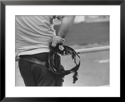 State Trooper Holding Burnt Cap Of A Guard Taken Hostage During Riot At Attica State Prison by John Shearer Pricing Limited Edition Print image
