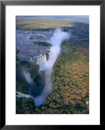 Aerial View Of Victoria Falls, Zimbabwe by Geoff Renner Pricing Limited Edition Print image