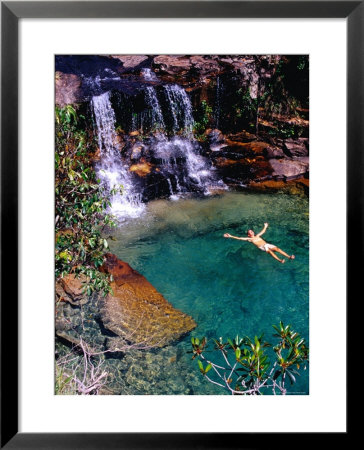 Man Relaxing In Pool At Base Of Pacheco Falls, Quebrada Pacheco, Bolivar, Venezuela by Krzysztof Dydynski Pricing Limited Edition Print image