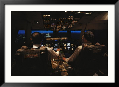 Pilots Sitting In The Cockpit At Night by Paul Chesley Pricing Limited Edition Print image