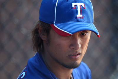 Peoria, Az - March 07: Texas Rangers V San Diego Padres - Yu Darvish And Yorvit Torrealba by Christian Petersen Pricing Limited Edition Print image