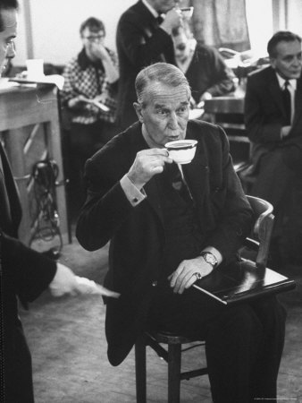 Maurice Chevalier Sips A Cup Of Coffee During Rehearsal Of Broadway Of Lerner And Loewe by Leonard Mccombe Pricing Limited Edition Print image