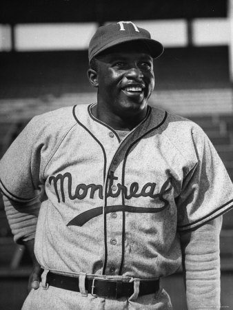 Baseball Great Jackie Robinson Wears Montreal Uniform During Filming Of The Jackie Robinson Story by J. R. Eyerman Pricing Limited Edition Print image