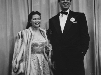 Actors Yvonne De Carlo And Rock Hudson Posing Together At The Rko Pantages Theater by Ed Clark Pricing Limited Edition Print image