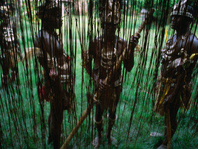 Men In Traditional Dress At Kamindimbit Village On The Sepik River, Papua New Guinea by Jerry Galea Pricing Limited Edition Print image