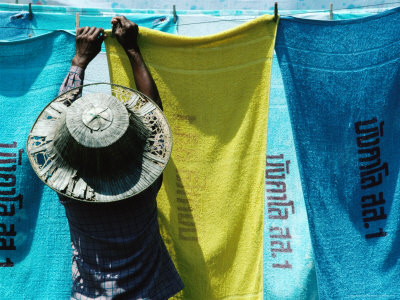 Hanging Out Towels To Dry In Resort, Prachuap Khiri Khan, Thailand by Bill Wassman Pricing Limited Edition Print image