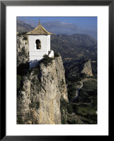 Bell Tower In Village On Steep Limestone Crag, Guadalest, Costa Blanca, Valencia Region, Spain by Tony Waltham Pricing Limited Edition Print image
