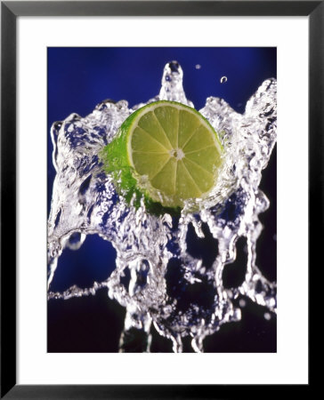 Slice Of Lime On Splashing Water by Dirk Olaf Wexel Pricing Limited Edition Print image