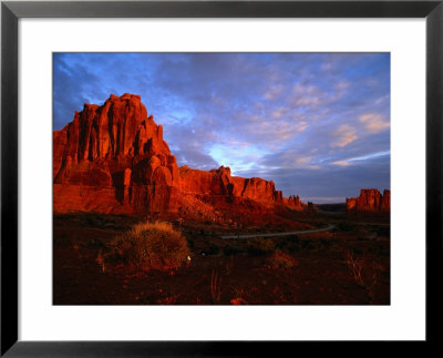 Courthouse Towers At Dusk, Arches National Park, Usa by Carol Polich Pricing Limited Edition Print image