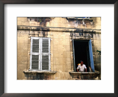 Man With Cat In Window, Avignon, Provence-Alpes-Cote D'azur, France by Glenn Van Der Knijff Pricing Limited Edition Print image
