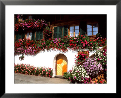 Flowers And Chalet In The Resort Area, Gstaad, Switzerland by Bill Bachmann Pricing Limited Edition Print image