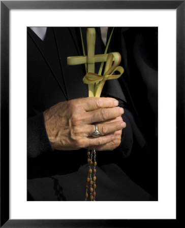 A Nun's Hands Holding Two Crosses Made Of Palm Leaves, St. Anne Church, Israel by Eitan Simanor Pricing Limited Edition Print image