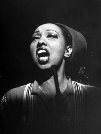 Entertainer Josephine Baker Performing A Song On Stage At The Strand Theater During Her Us Tour by Alfred Eisenstaedt Pricing Limited Edition Print image