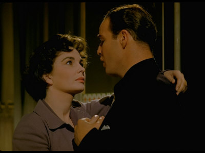 Actor Marlon Brando Singing Intimately To Jean Simmons During Scene From Film Guys And Dolls by Gjon Mili Pricing Limited Edition Print image