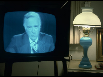 Tv Image Of Cbs Newscaster Walter Cronkite Giving Analysis Of Pres. Nixon's Resignation Speech by Gjon Mili Pricing Limited Edition Print image