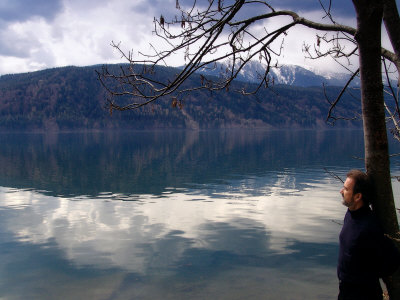Man Gazing For Inspiration Across The Lake by Ilona Wellmann Pricing Limited Edition Print image