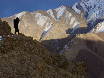 Photographer, Steve Winter, Taking Images On Kharlung Ridge by Steve Winter Pricing Limited Edition Print image