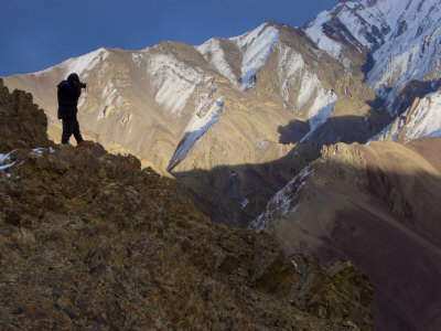 Photographer, Steve Winter, Taking Images On Kharlung Ridge by Steve Winter Pricing Limited Edition Print image