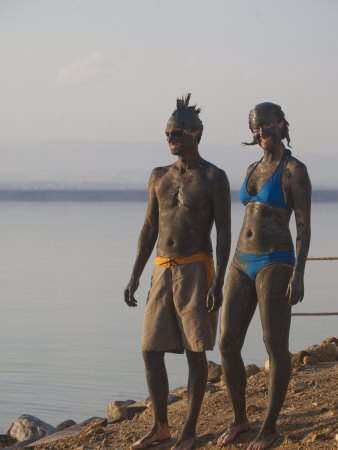 Couple With Therapeutic Dead Sea Mud Smeared On Them by Taylor S. Kennedy Pricing Limited Edition Print image
