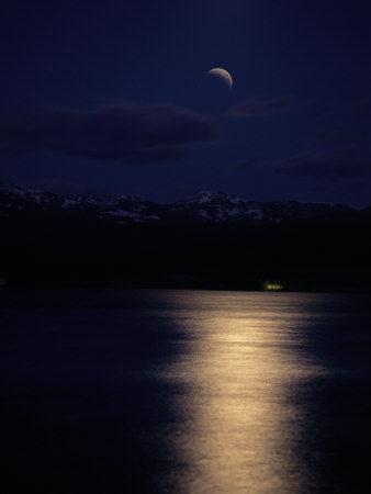Moonlight Reflected On The Surface Of Yellowstone Lake by Tom Murphy Pricing Limited Edition Print image