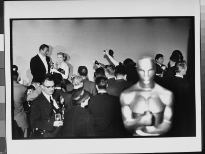 Press Surrounding John Wayne And Joane Woodward, At The 30Th Academy Awards, Rko Pantages Theatre by Ralph Crane Pricing Limited Edition Print image