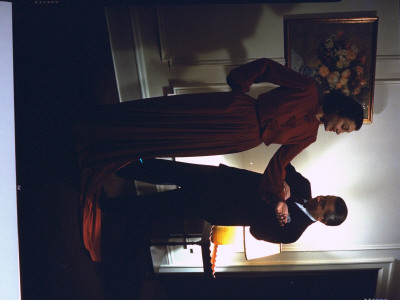 Actress Katharine Cornell Having Her Dress Inspected By Unidentified Man, Probably Her Couturier by Peter Stackpole Pricing Limited Edition Print image