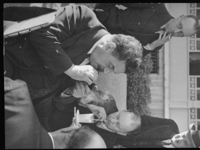 French Prime Minister Edouard Herriot Lighting Pipe Ouside While Chatting With Other Politicos by Alfred Eisenstaedt Pricing Limited Edition Print image