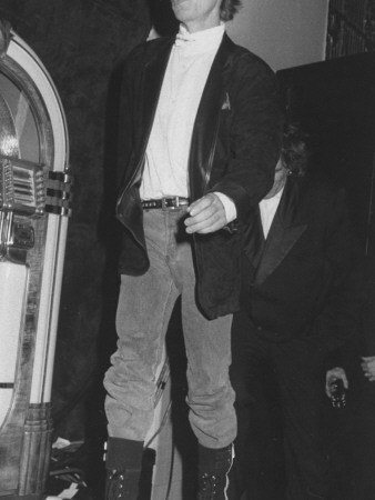 Rock Star Mick Jagger Wearing A Suede Blazer At The Rock And Roll Hall Of Fame Ceremonies by David Mcgough Pricing Limited Edition Print image