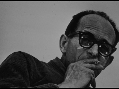 Nazi War Criminal Adolf Eichmann Smoking In His Cell At Djalameh Jail; Haifa by Gjon Mili Pricing Limited Edition Print image