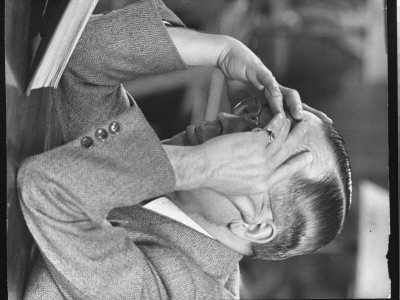 Man Pondering Over Book In The New York Public Library by Alfred Eisenstaedt Pricing Limited Edition Print image