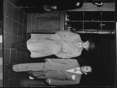 Writer Damon Runyon Walking With Unidentified Man by Gjon Mili Pricing Limited Edition Print image