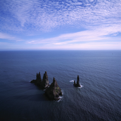 The Cliffs Reynisdrangar Rising From The Sea By The South Coast Of Iceland by Throstur Thordarson Pricing Limited Edition Print image