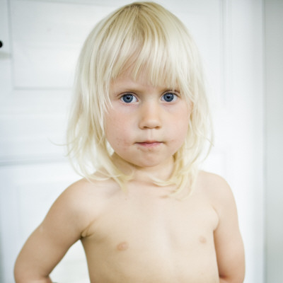 A Little Blonde Girl In The Bathroom, Sweden by Marie Rosenkrantz Gjedsted Pricing Limited Edition Print image