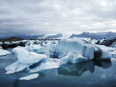 Icebergs Floating In Glacial Water, Iceland by Atli Mar Pricing Limited Edition Print image