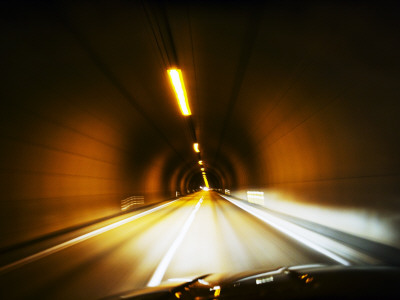 A Car Driving Through The Tunnel Under Fjord Hvalfjord, Iceland by Gunnar Svanberg Skulasson Pricing Limited Edition Print image