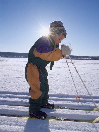 A Boy Cross Country Skiing by Kim Naylor Pricing Limited Edition Print image