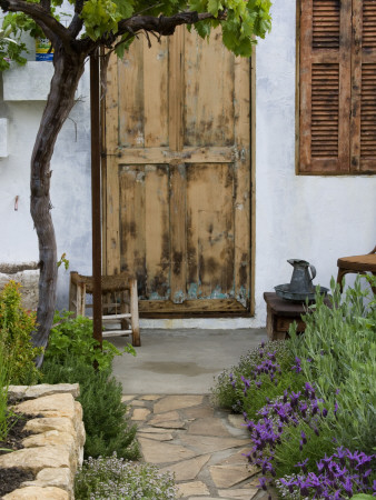 Chelsea Flower Show 2006: Lebanese Courtyard Designed By Nada Habet: Path To Wooden Door by Clive Nichols Pricing Limited Edition Print image