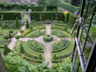 Box Circle With Topiary Shapes And Irises Seen From The Top Window Of The Abbey House, Wiltshire by Clive Nichols Pricing Limited Edition Print image