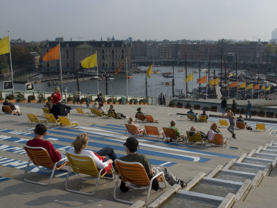 Sunbathing On The Roof Of Nemo, Eastern Docks, Amsterdam by Natalie Tepper Pricing Limited Edition Print image