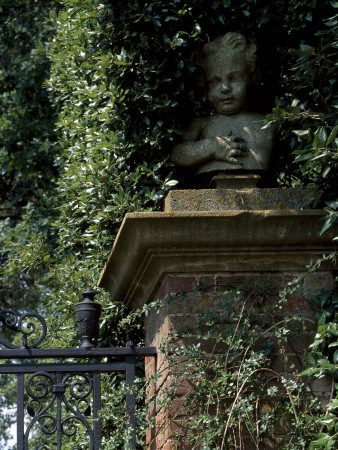 Hidcote Manor Garden, Cotswolds, Gloucestershire, England, Detail Of Stone Cherub On Gatepost by Richard Bryant Pricing Limited Edition Print image