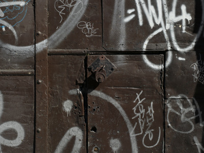 Graffiti On Gate, Spitalfields, London by Richard Bryant Pricing Limited Edition Print image