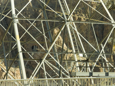 Hoover Dam Electricity Pylons And Overhead Crane In Background by Richard Williamson Pricing Limited Edition Print image