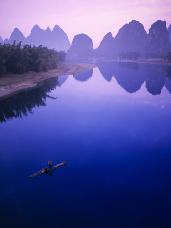 Fisherman On Raft In Li River, Yangshou, Guanxi, China by Charles Crust Pricing Limited Edition Print image