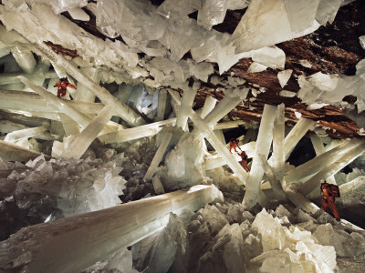 Massive Beams Of Selenite Dwarf Explorers In The Cave Of Crystals by Carsten Peter/Speleoresearch & Films Pricing Limited Edition Print image