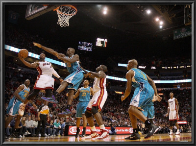 New Orleans Hornets V Miami Heat: Dwyane Wade And Emeka Okafor by Mike Ehrmann Pricing Limited Edition Print image