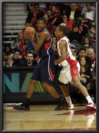 Atlanta Hawks V Toronto Raptors: Joe Johnson And Demar Derozan by Ron Turenne Pricing Limited Edition Print image