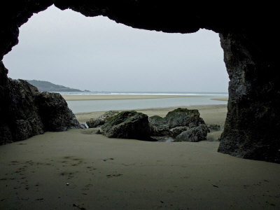 Looking Out To The Sea From A Cave Along A Northern California Beach by Stephen Sharnoff Pricing Limited Edition Print image